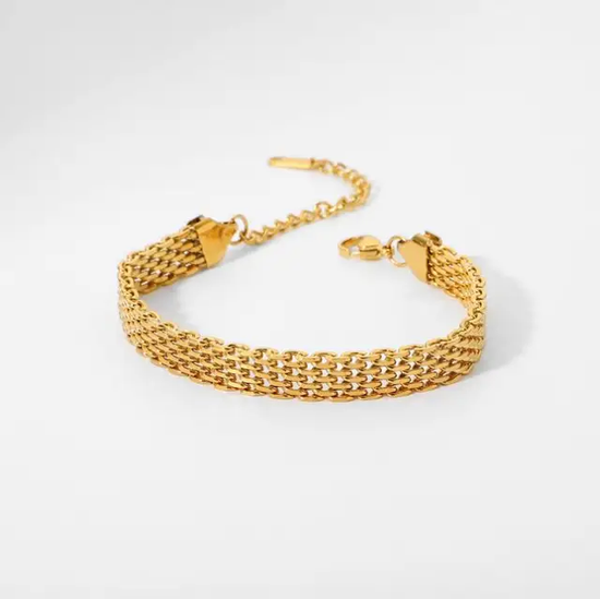 Gold-tone stainless steel chain bracelet with adjustable clasp on a white background