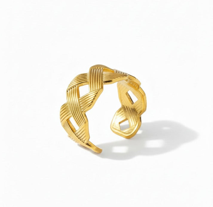 Gold-tone stainless steel braided adjustable ring, anti-tarnish jewelry on white background