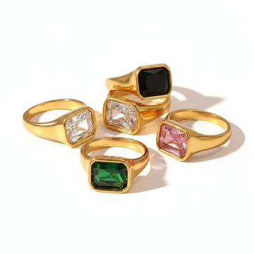 Gold stainless steel rings with square-cut black, green, pink, and clear stones
